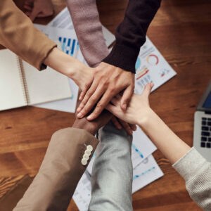 backing-her-venture-team-hands